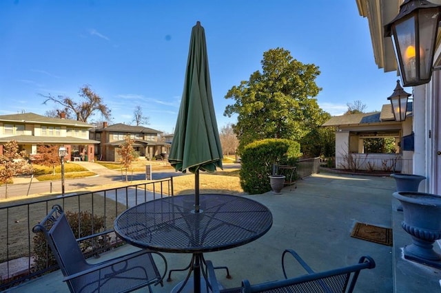 208 NW 20th St, Oklahoma City, OK 73103 - view of patio featuring a balcony