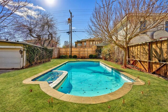 208 NW 20th St, Oklahoma City, OK 73103 - view of swimming pool with a yard, a fenced backyard, and a pool with connected hot tub