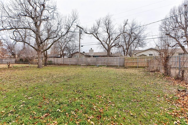 view of yard featuring a fenced backyard