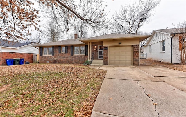 ranch-style house featuring roof with shingles, driveway, a chimney, a garage, and brick siding