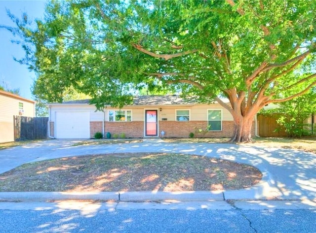 single story home featuring a garage