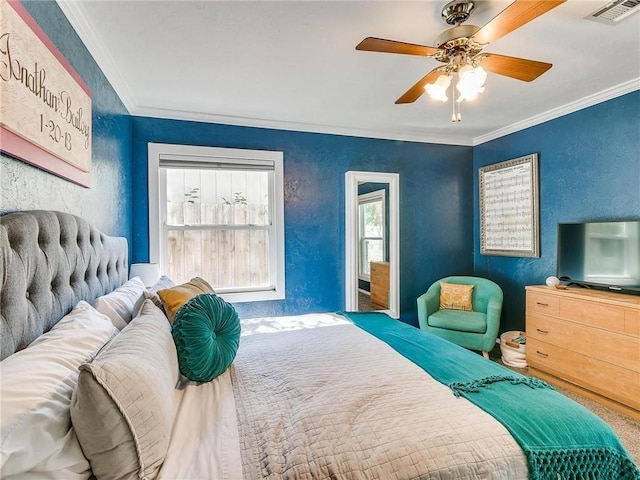 bedroom with crown molding and ceiling fan