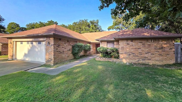 view of side of home with a garage and a yard