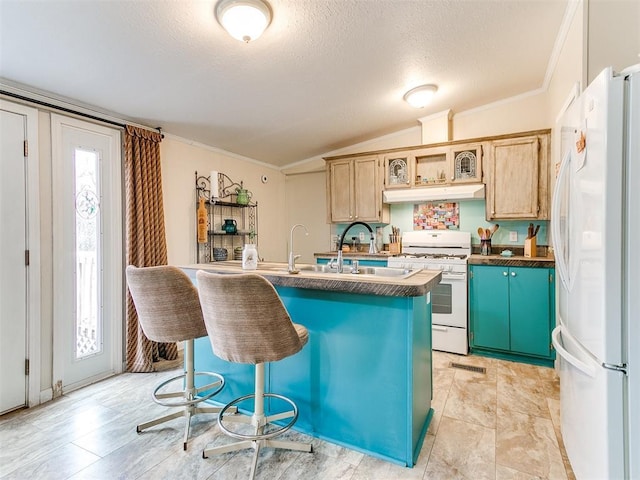 kitchen with white appliances, a breakfast bar area, crown molding, a center island with sink, and light brown cabinetry