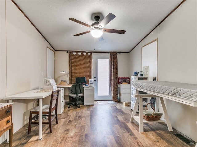 office area with crown molding, ceiling fan, and hardwood / wood-style flooring