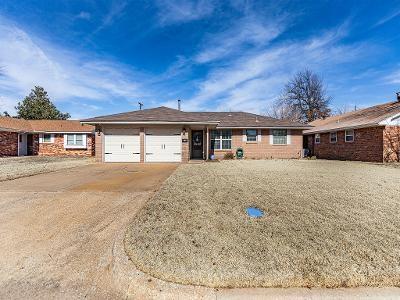 ranch-style house featuring a garage