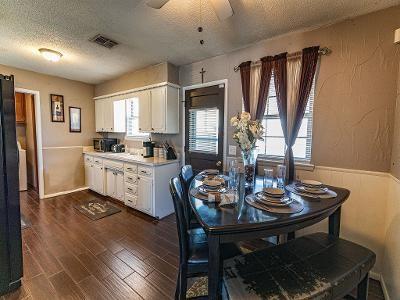 kitchen featuring ceiling fan, dark hardwood / wood-style floors, a textured ceiling, and white cabinets