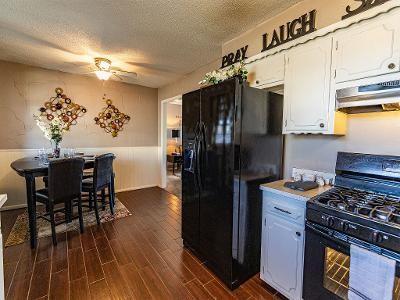 kitchen featuring black appliances, a textured ceiling, dark hardwood / wood-style flooring, ceiling fan, and white cabinets