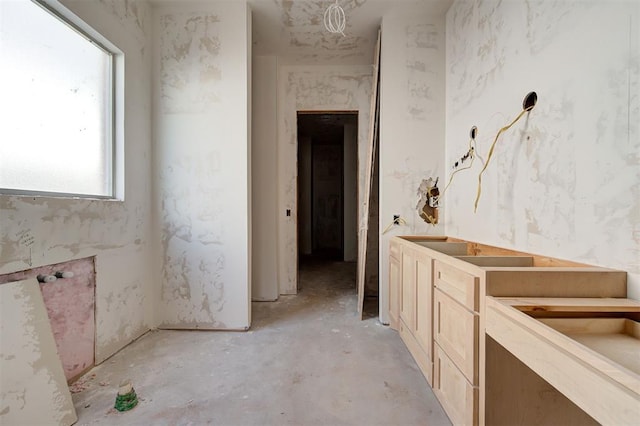 bathroom with concrete floors