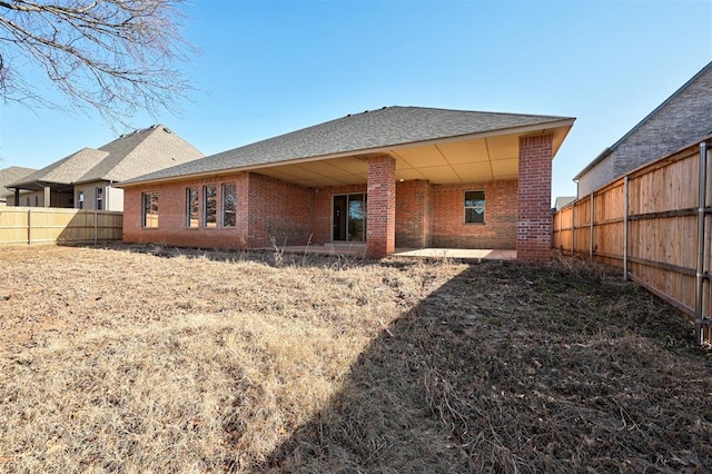 back of house featuring a patio