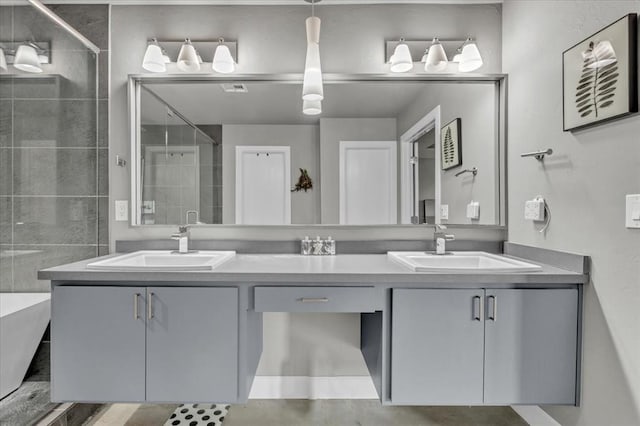 bathroom featuring vanity and shower with separate bathtub