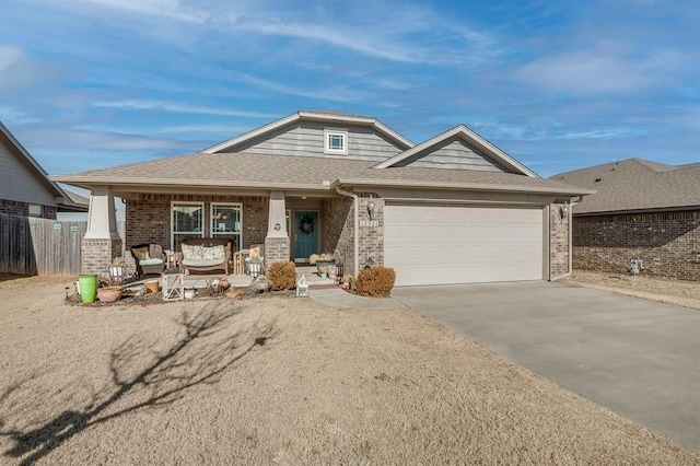 craftsman inspired home with a porch and a garage