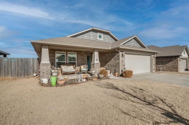 craftsman house featuring a garage and covered porch