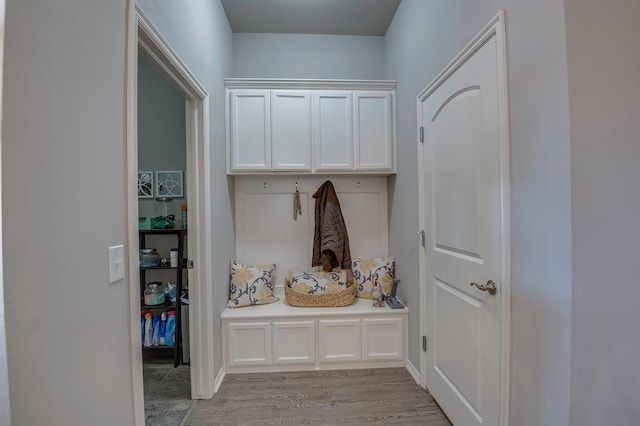 mudroom with light hardwood / wood-style floors