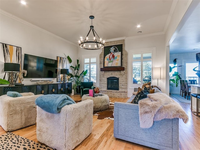 3208 Rolling Woods Dr, Norman, OK 73072 - living area with a notable chandelier, crown molding, and wood finished floors