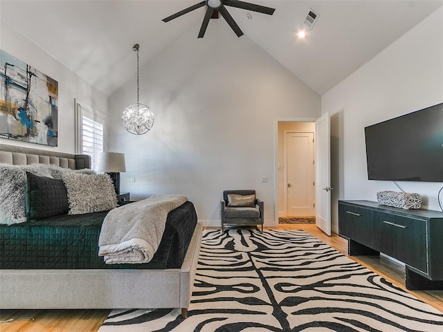 3208 Rolling Woods Dr, Norman, OK 73072 - bedroom featuring visible vents, light wood finished floors, and high vaulted ceiling