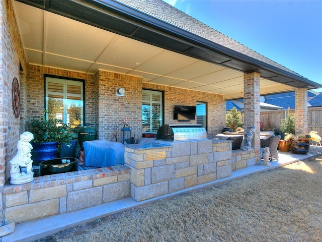 3208 Rolling Woods Dr, Norman, OK 73072 - view of patio featuring grilling area and exterior kitchen