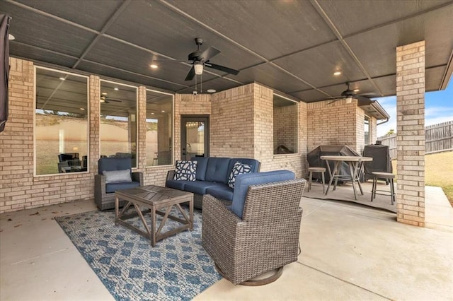 view of patio featuring outdoor lounge area and ceiling fan