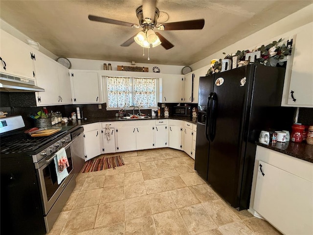 kitchen with stainless steel appliances, sink, and white cabinets