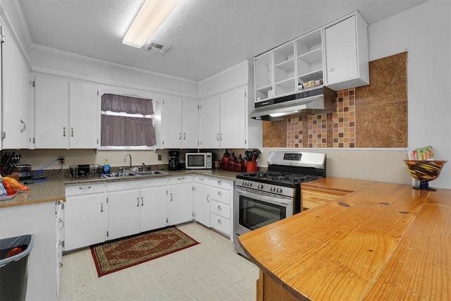 kitchen featuring white cabinetry, sink, and stainless steel appliances