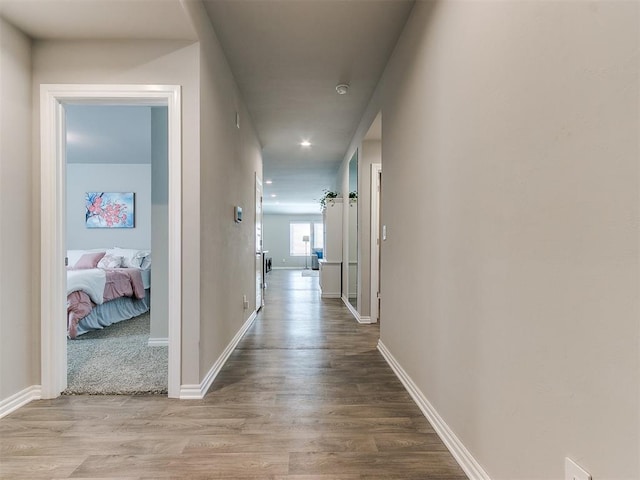 corridor featuring hardwood / wood-style flooring