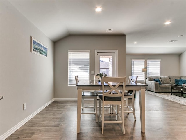 dining area featuring wood-type flooring