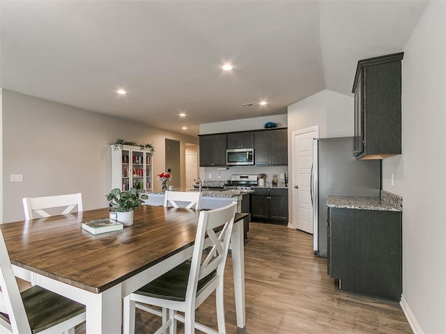 dining room featuring light hardwood / wood-style floors