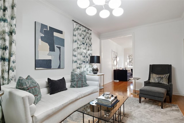 living room with hardwood / wood-style flooring and ornamental molding