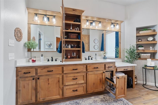 bathroom with vanity and wood-type flooring