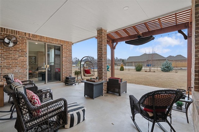 view of patio featuring an outdoor hangout area and a pergola