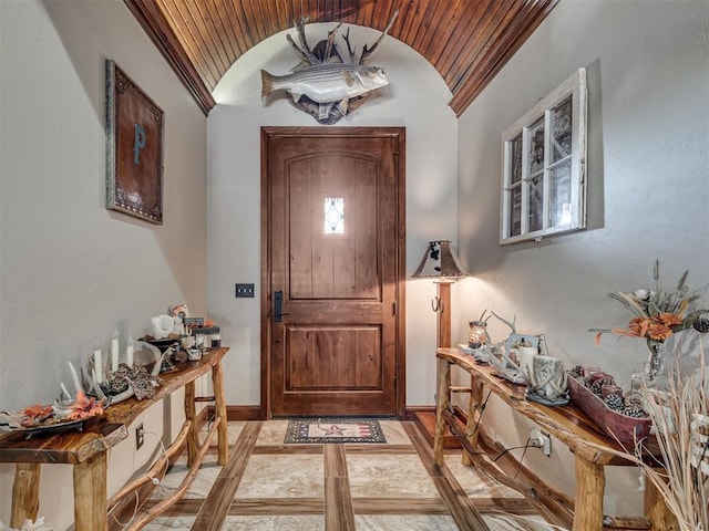 foyer featuring lofted ceiling