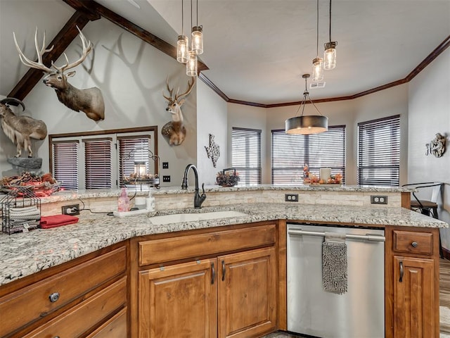 kitchen featuring sink, decorative light fixtures, ornamental molding, and dishwasher