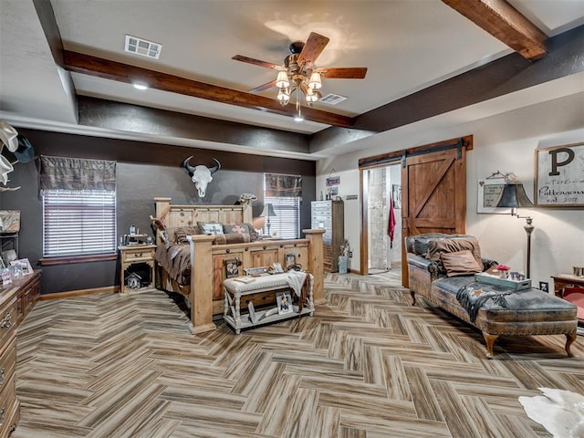 bedroom featuring ceiling fan, a barn door, and beamed ceiling