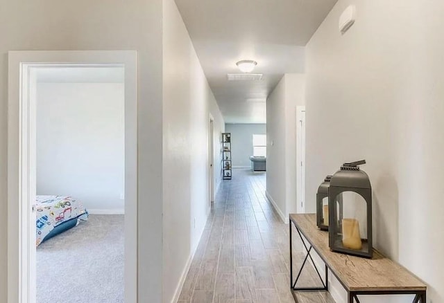 hall featuring light hardwood / wood-style floors