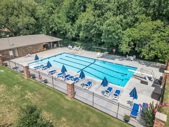 view of swimming pool featuring a patio area