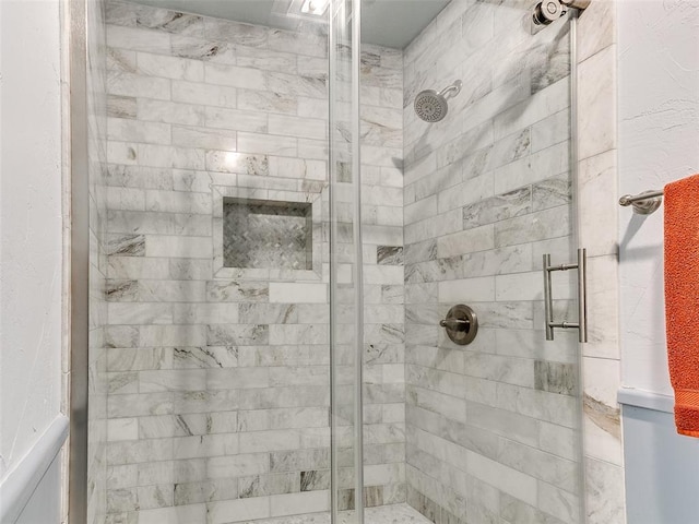 bathroom featuring walk in shower