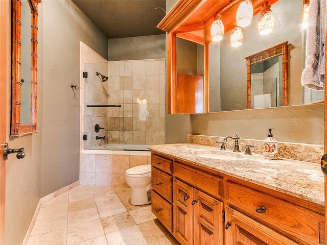 full bathroom with tiled shower / bath combo, toilet, and vanity