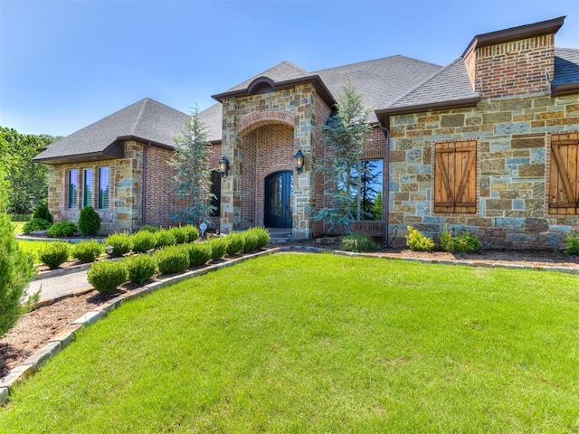 view of front of house with a front lawn