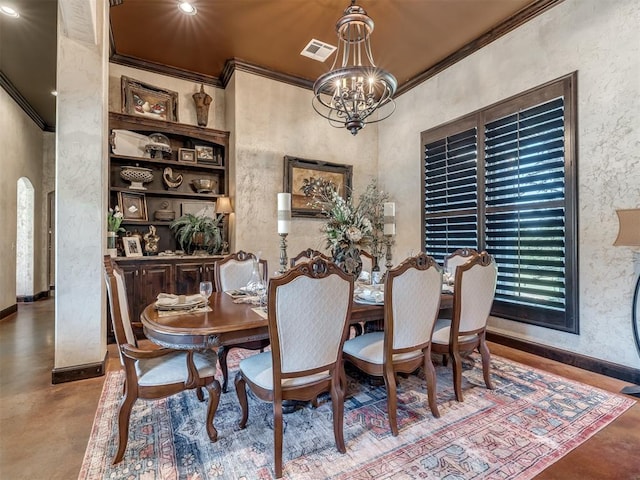 dining area featuring an inviting chandelier and ornamental molding