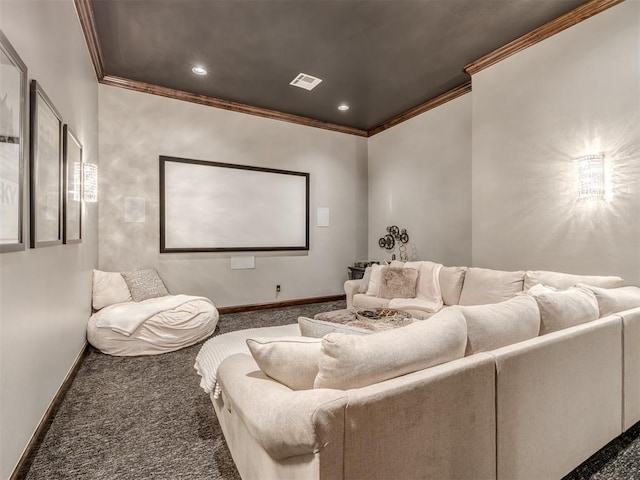 carpeted cinema room with crown molding