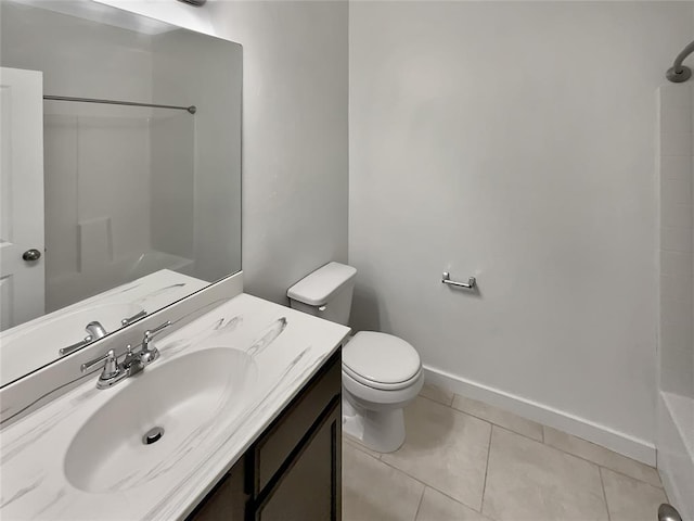 bathroom with walk in shower, vanity, toilet, and tile patterned flooring