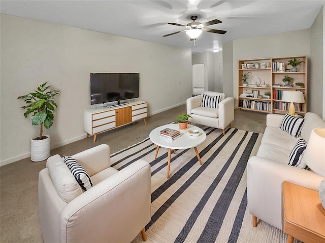 carpeted living room featuring ceiling fan