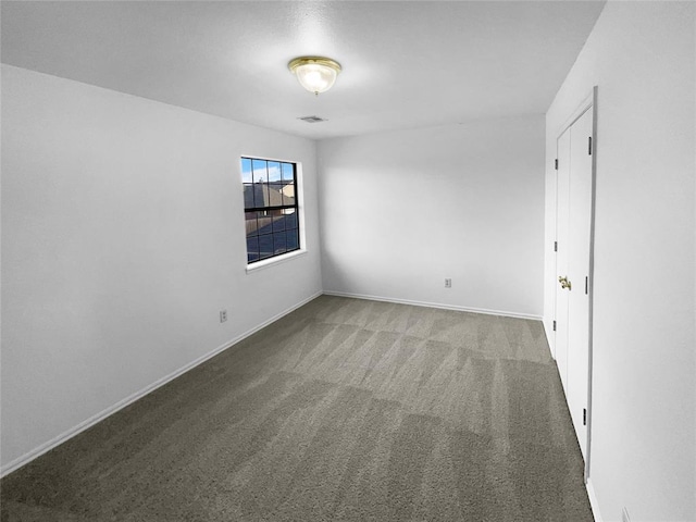 empty room with carpet floors