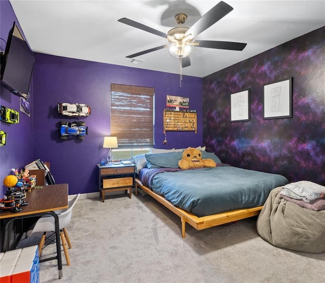 bedroom featuring carpet flooring, ceiling fan, and baseboards