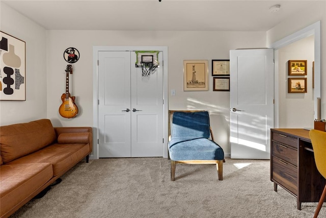 living area with carpet