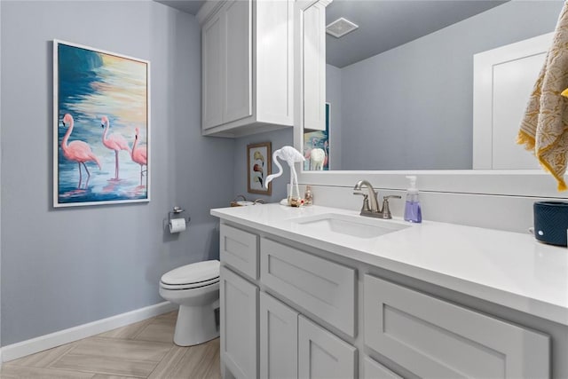 2802 Cloud Nine Cir, Weatherford, OK 73096 - bathroom featuring baseboards, toilet, and vanity