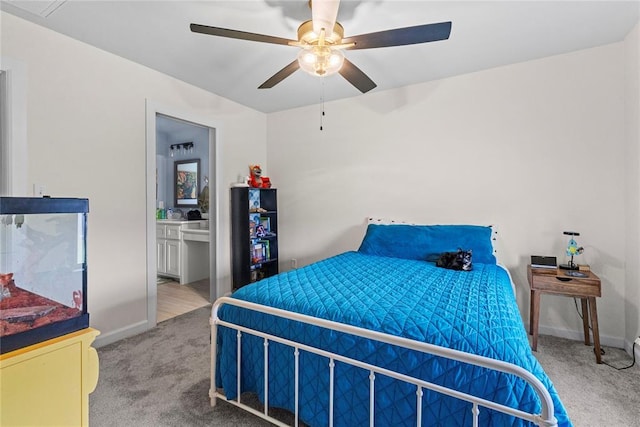 2802 Cloud Nine Cir, Weatherford, OK 73096 - bedroom with carpet flooring, baseboards, and a ceiling fan