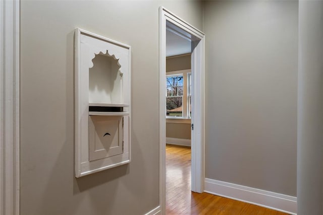 corridor featuring light hardwood / wood-style floors