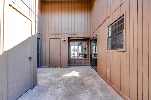 entrance to property featuring a patio area