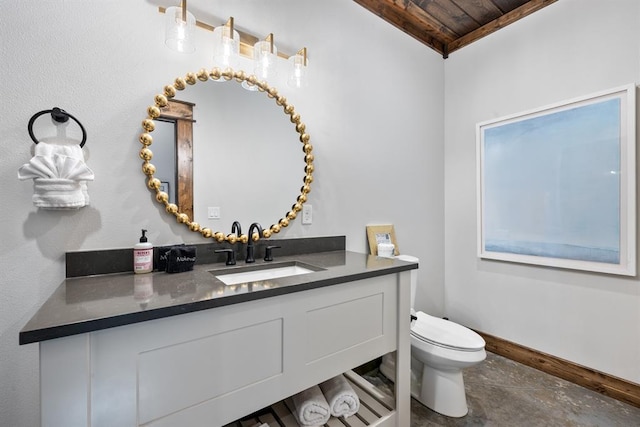 bathroom featuring vanity, toilet, and wooden ceiling